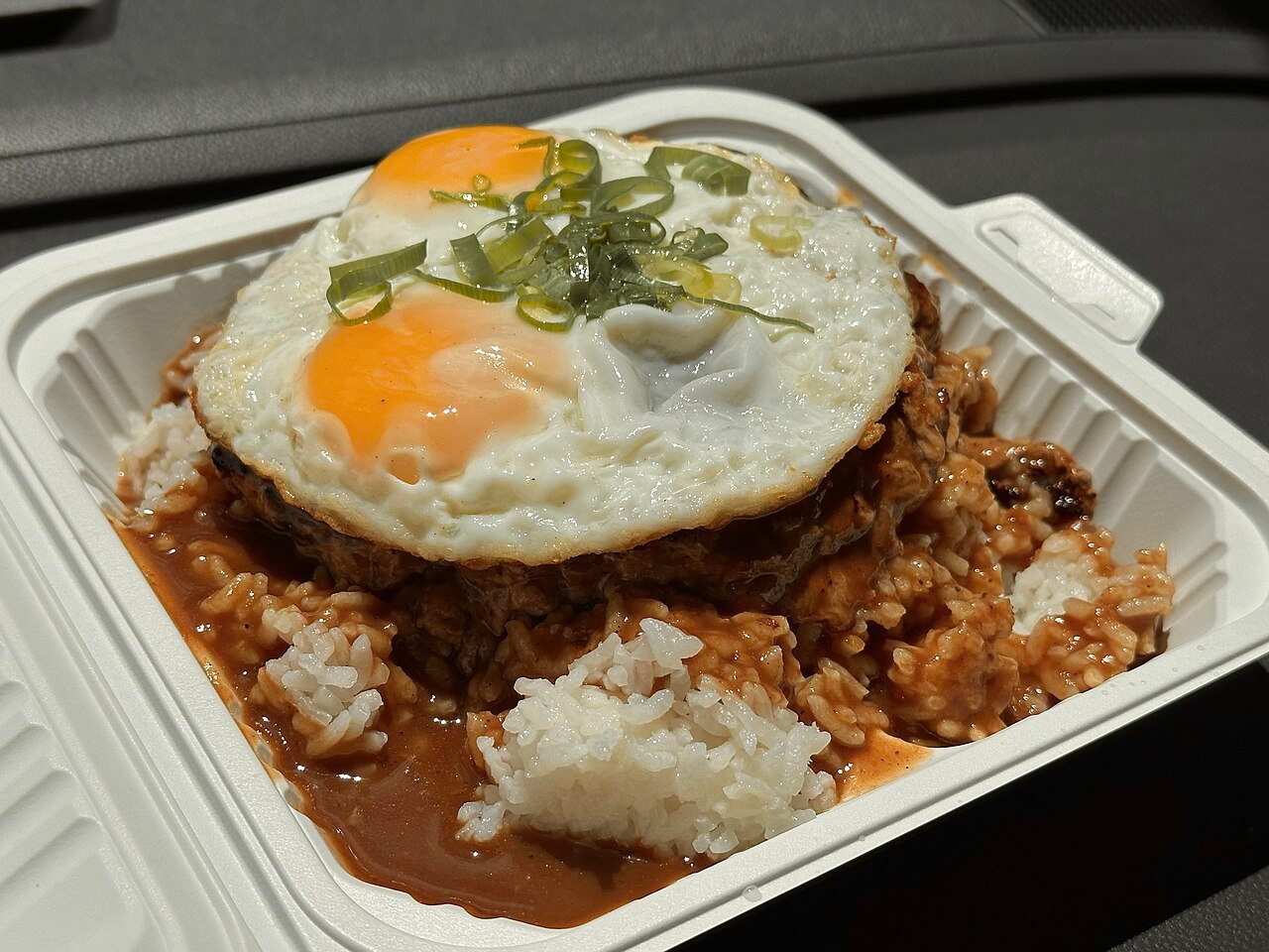Loco moco with rice, hamburger patty, fried egg and gravy